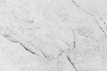 Texture and seamless background of white granite stone