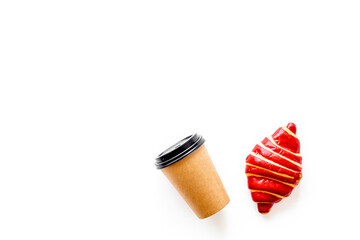 Croissants with coffee - breakfast on white table top view