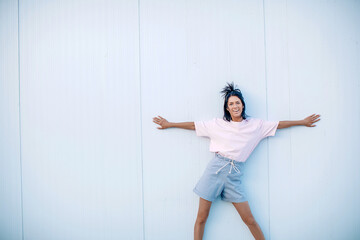Image of happy young lady standing. Wall background. Sensual. Smile woman. Crazy. Photo. 