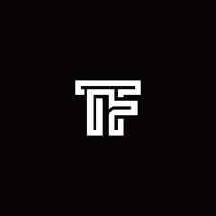 TF monogram logo with abstract line