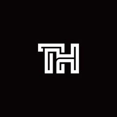 TH monogram logo with abstract line © duagaris