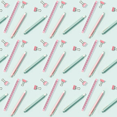 Creative seamless pattern with office supplies, color pencils, pens, puler and metal paper clips. School and education concept.