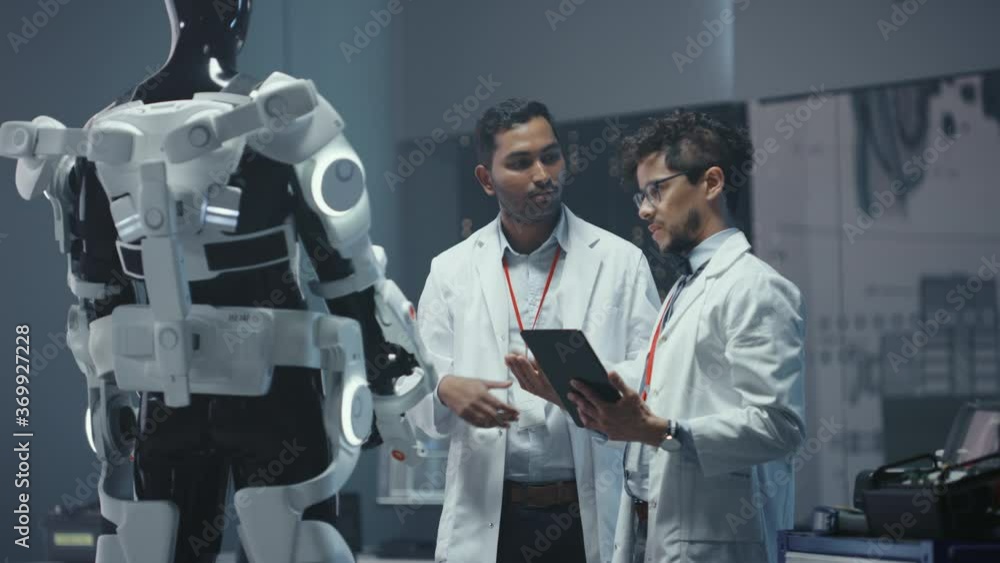 Aufkleber In Robotics Development Laboratory International Team of  Engineers and Scientists Work on Robotics Exoskeleton Prototype. Designing Powered Exosuit to Help Disabled People Walk, Workers to Lift Goods