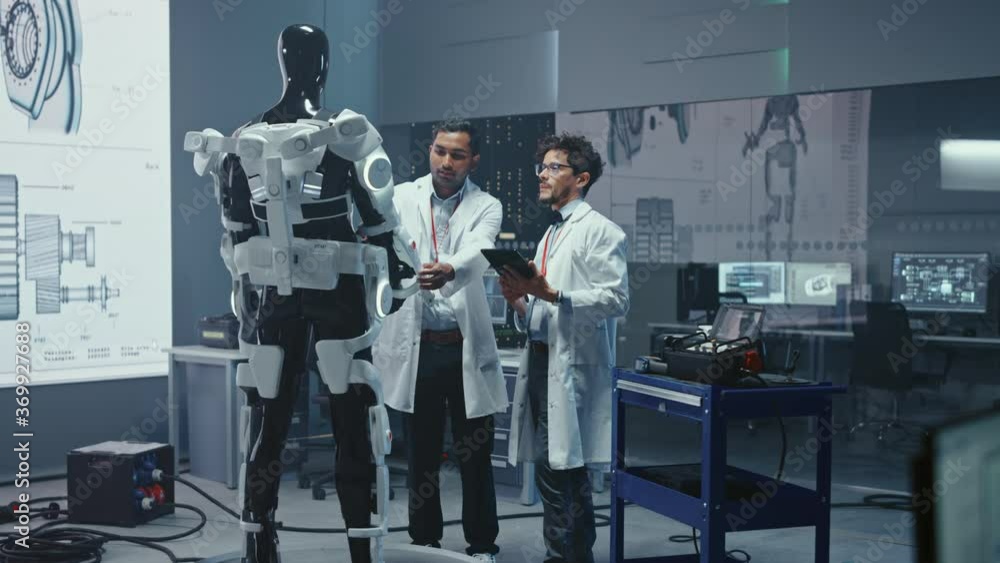 Aufkleber In Robotics Development Laboratory International Team of  Engineers and Scientists Work on Robotics Exoskeleton Prototype. Designing Powered Exosuit to Help Disabled People Walk, Workers to Lift Goods