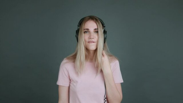 Sexy girl with big headphones