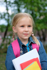 Portrait of a little girl going to school