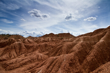 A canyon with a mountain in the background