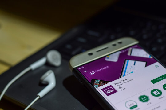 PowerApps dev application on Smartphone screen. PowerApps is a freeware web browser developed by Microsoft Corporation