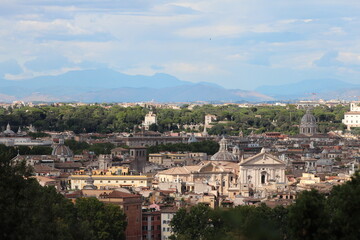 Obraz premium Rome cityscape , View from the top in Gianicolo hill Rome on cloudy day . Aerial picturesque view of Rome .