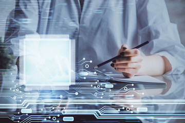 Multi exposure of hands making notes with digital coding icons. Computer learning concept.