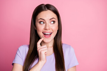 Closeup photo of charming silly lady good mood look side empty space finger chin think creative...