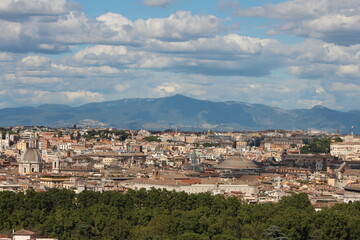 Fototapeta na wymiar Rome cityscape , View from the top in Gianicolo hill Rome on cloudy day . Aerial picturesque view of Rome .