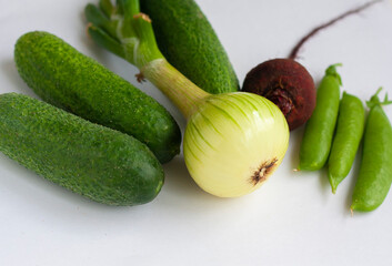 Fresh vegetables, cucumbers, onions, beets and peas