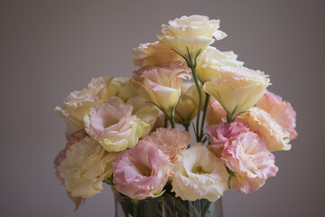 Lisianthus flower arrangement in harsh light 