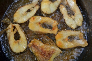 The preparation of the fish caught on fire.