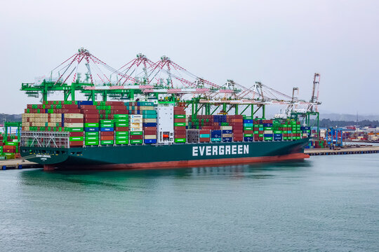 Colon, Panama - December 8, 2019: Evergreen Container Ship With Full Of Cargo Docked In Port