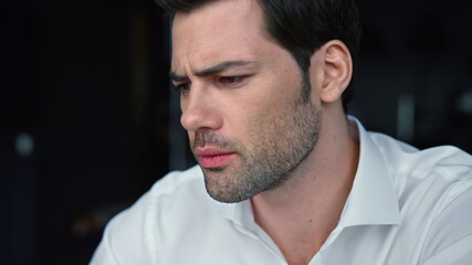 Fototapeta premium Businessman face working in office. Man making surprised face expression
