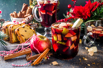 Festive winter fruit punch or sangria drink. Christmas mulled red wine. Ponche de frutas Navideño...