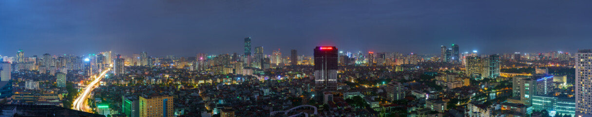Fototapeta na wymiar Cityscape of Hanoi skyline at Nguyen Chi Thanh street, Dong Da district during sunset time in Hanoi city, Vietnam in 2020
