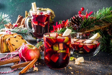 Festive winter fruit punch or sangria drink. Christmas mulled red wine. Ponche de frutas Navideño...