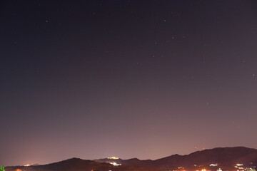 view of stars and mountain