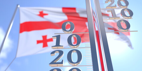 Thermometer shows 0 zero air temperature near waving flag of Georgia. Weather forecast conceptual 3D rendering