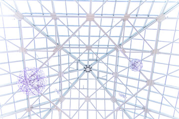 The transparent roof of the shopping center is decorated with huge balloons and glowing led...