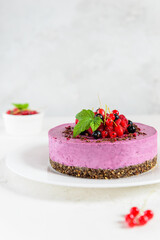 Mousse cashew cake with black currant and chocolate praline. Sugar, lactose, gluten free.