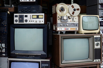 Old vintage televisions and radios background