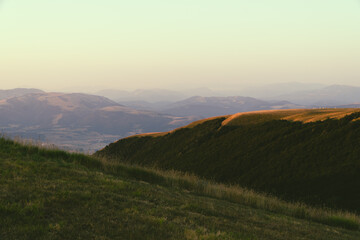Fototapeta premium Sunset in the middle of the mountain.