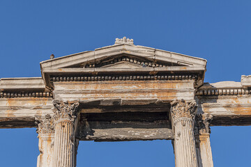 Famous Hadrian's Gate or Arch of Hadrian - one of the main landmarks of Athens. Arch of Hadrian erected in honor of Roman emperor Hadrian in 2nd century A.D. Athens, Greece.