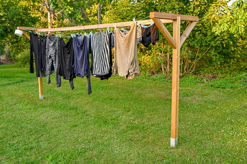 clothes hanging to dry on home made drying rack