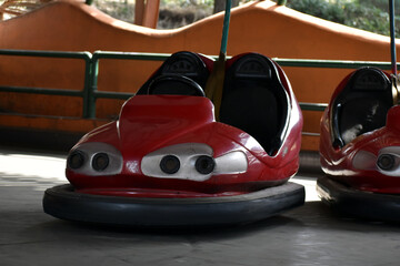 Beautiful picture of red car in play park