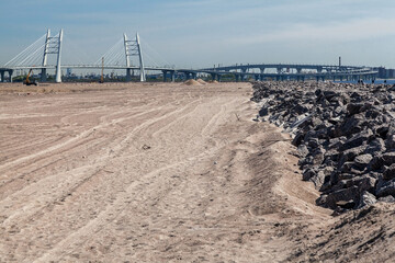Sandy wasteland near cable-stayed bridge