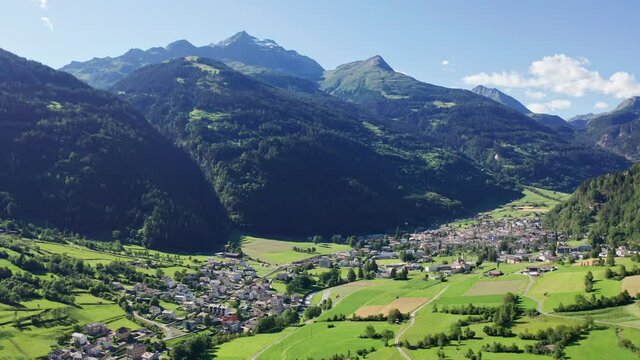 Aerial 4K - Switzerland, Poschiavo Valley, view of the town