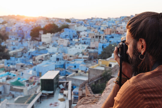 Tourist Makes A Photo Of Blue City