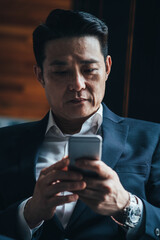 Close up of business man using phone stock photo 