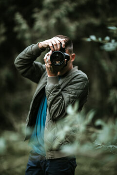 Young Man Taking Photos