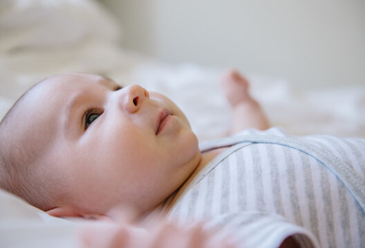 Baby on Bed Looking Up