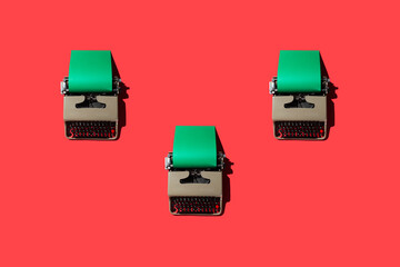 Typewriters on Red Backdrop