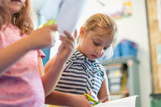 Students in classroom doing a crafts activity