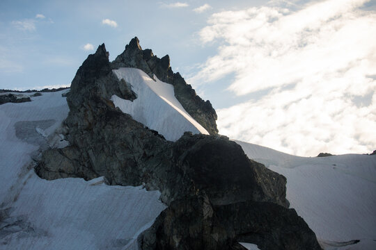 A glaciated peak at sunset
