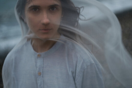 Seaside stormy woman portrait