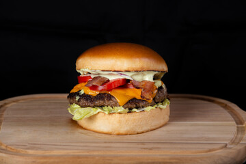 hamburger on a wooden table, 