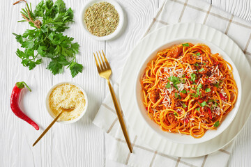 spaghetti with pork vegetable ragout in a bowl