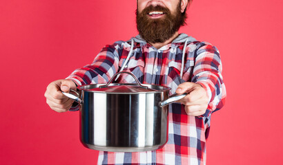 for you. mature chef in checkered shirt. prepare meal food at home. professional cook. bearded man hold kitchen pan. brutal hipster cooking with saucepan. housekeep husband cook in pot