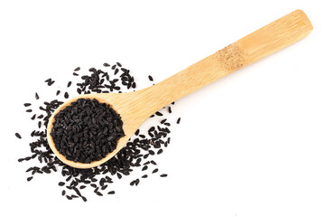Nigella sativa or Black cumin in wooden scoop isolated on white background. Top view. Flat lay.