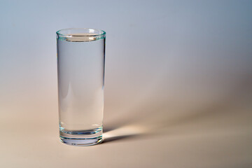 A full glass beaker of clean water.