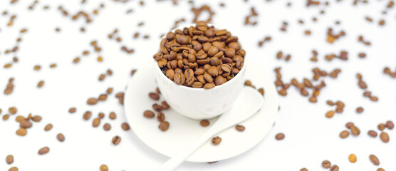 white coffee Cup and coffee beans on a white background, the concept of cheerfulness