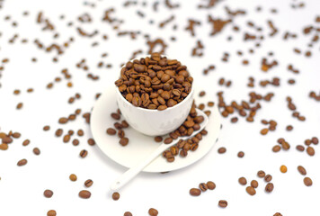 white coffee Cup and coffee beans on a white background, the concept of cheerfulness